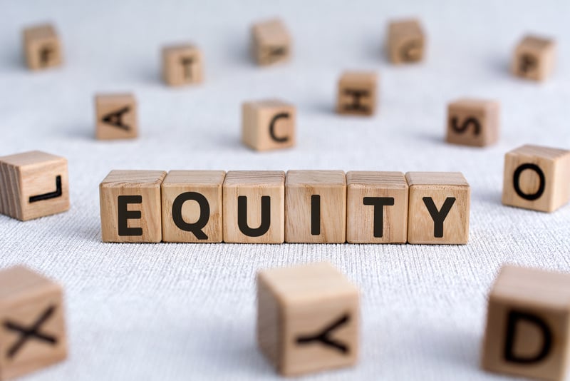 Equity - words from wooden blocks with letters